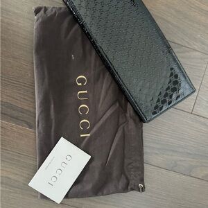 Gucci Glossy Black Patent Leather Embossed Clutch